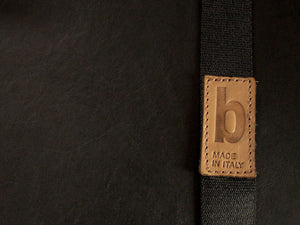 signature hot stamped detail on leather. handmade in Italy